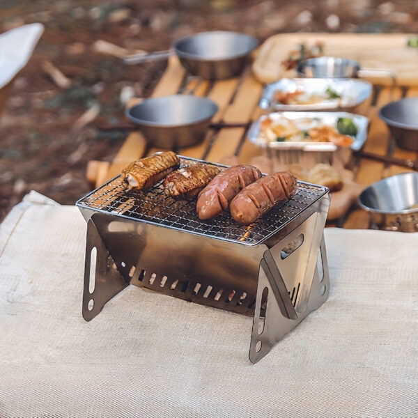 1pc Portable Camping Stove - Durable Stainless Steel Folding Wood Burning Stove with Grill Plate for Outdoor Adventures, Backpacking, and BBQ - Compact, Lightweight, and Easy to Carry